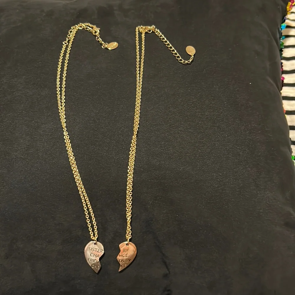 Kids two 18” sisters heart gold colored necklace with a 1” extender. Gently used